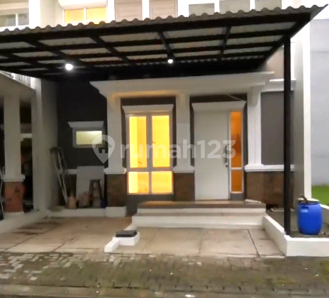 2-story house in Kota Wisata, East Jakarta.