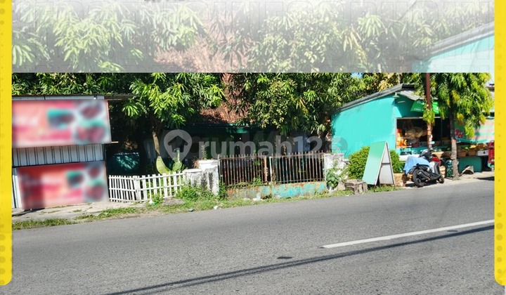 Strategic Large Land with Building Bonus on Jl. Adi Sumarmo, Nusukan, Banjarsari, Solo. Strategic Large Land with Building Bonus on Jl. Adi Sumarmo, Nusukan, Banjarsari, Solo.