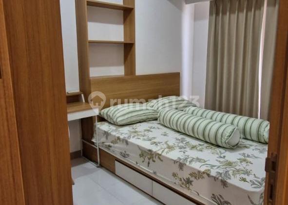 For Quick Sale: Tokyo Riverside Apartment Unit, 2-Bedroom, Fully Furnished, Well-Maintained, Move-In Ready in PIK 2, North Jakarta. Specifications: Type: 2-Bedroom, Area: 36m², Condition: Fully Furnished including 2 AC units, TV, Refrigerator, Floor: Middle Floor, Title: PPJB. Sale Price: [to be provided]. 2