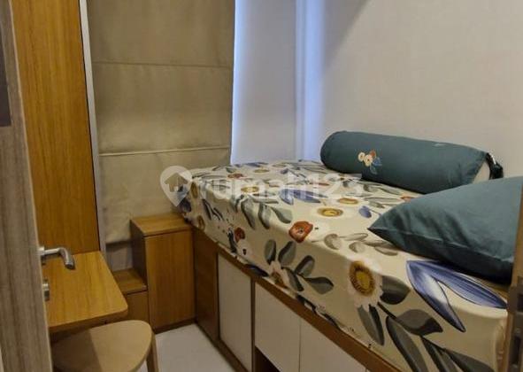 For Quick Sale: Tokyo Riverside Apartment Unit, 2-Bedroom, Fully Furnished, Well-Maintained, Move-In Ready in PIK 2, North Jakarta. Specifications: Type: 2-Bedroom, Area: 36m², Condition: Fully Furnished including 2 AC units, TV, Refrigerator, Floor: Middle Floor, Title: PPJB. Sale Price: [to be provided]. 1