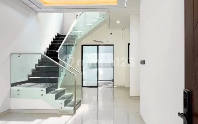 Minimalist 2-Story House in Darmo Permai 2
