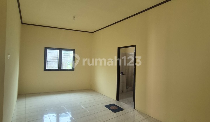 Corner House Location at Kilometer 9, Graha Wiyata Asri Housing Complex 2