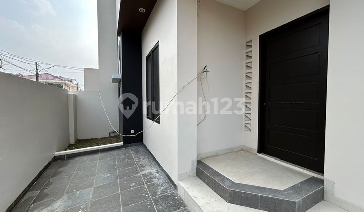 Rumah Modern Minimalis Lingkungan Nyaman Di Citra Jakarta Barat 2