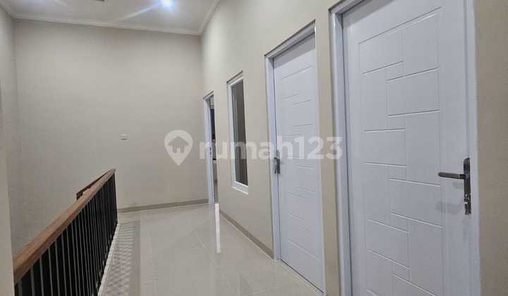 Rumah modern 2 lantai siap huni dalam cluster di Kiwi Graha bintaro  2