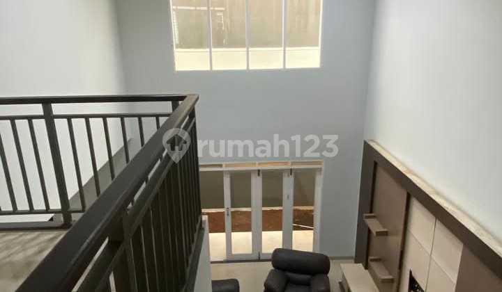Beautiful 2-Story House Fully Renovated Semi-Furnished with Front and Back Garden Facing South Prime Location in Batununggal Mulia - Dna 2
