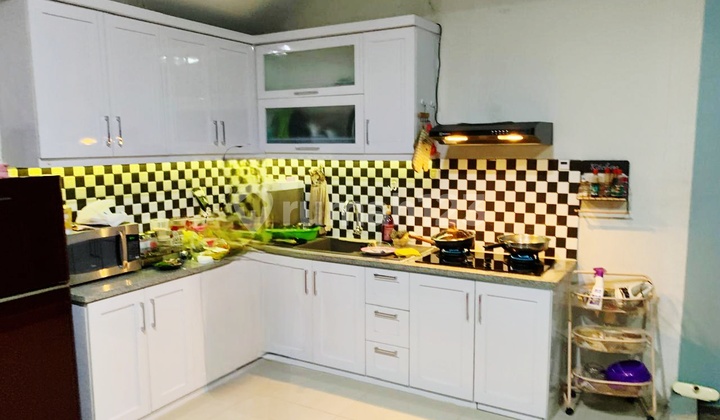 Minimalist House in Cosmo Estate Cluster Lippo Cikarang Fully Furnished with Electricity-Saving Solar Panels 2