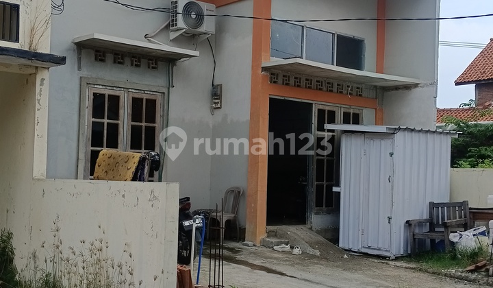 Rumah 1/2 Jadi Bangunan 2 Lantai Lingkungan Aman Bebas Banjir Dekat Ke Pusat Bisnis Kota 
