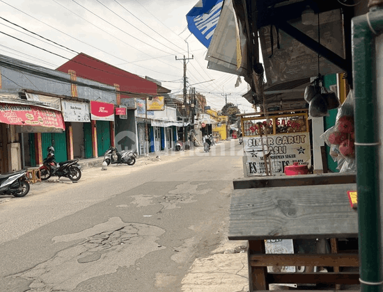 Rumah Satu Setengah Lantai Dengan Ruang Usaha Di Harapan Jaya 2