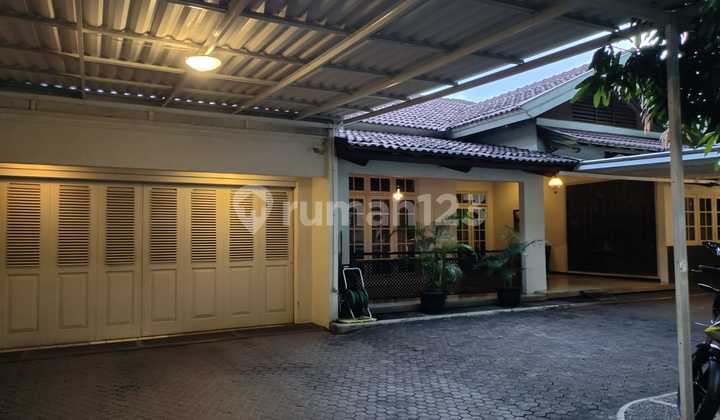 Serene Home with a Tranquil Pond on Bangka XI Street, South Jakarta 1