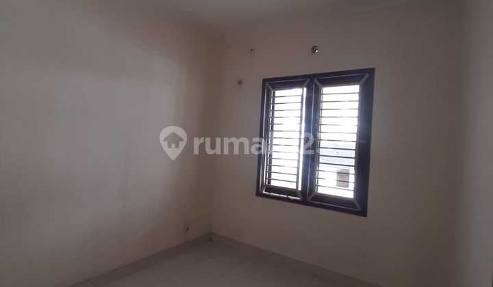 Nice House in a Green & Comfortable Environment, Ready to Occupy in the Harmoni Harapan Indah Cluster, Bekasi 2