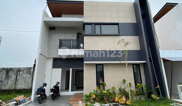 RUMAH MEWAH MODERN DALAM CLUSTER ONE GATE SYSTEM DI SENDANGADI