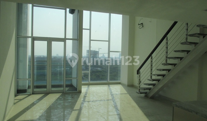 For sale at a loss, sold below purchase price, first come first served. SOHO Apartment Brooklyn Alam Sutera South Tangerang with a semi-gross area of 81.04 m2.