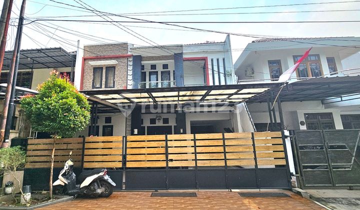 Ready-to-occupy 2-story house with swimming pool facilities in Era Mas 2000, Cakung, East Jakarta. 1