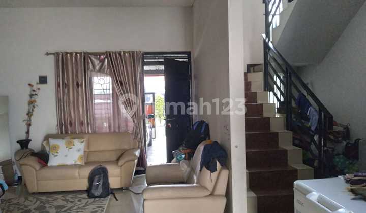 Rumah 2 Lantai dengan Halaman Belakang yang Luas di Grand Sharon