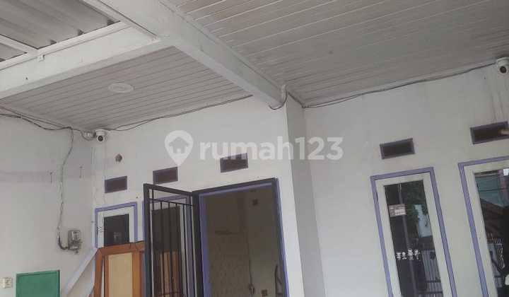 Rumah Full Renovasi Tinggi Dari Jalan di Perumahan Harapan Indah Bekasi. 1
