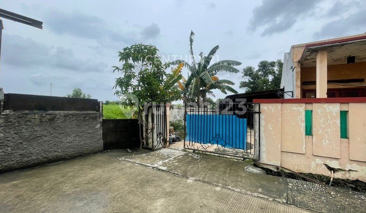 For Sale Corner Position House in Puri Harapan Housing Complex 2