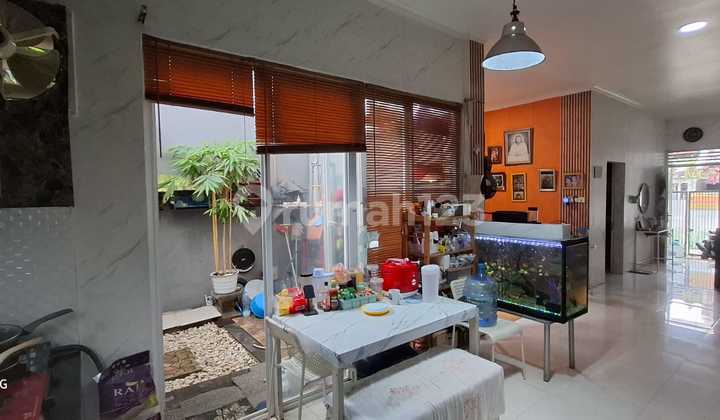 Dijual Cepat Rumah 2 Lantai Semi Furnish di Griya Kencana