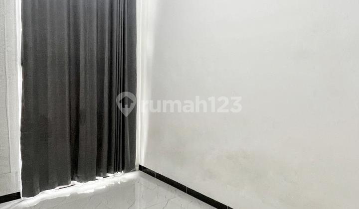 Two-Story 3-Bedroom House Take Over in Depok 2