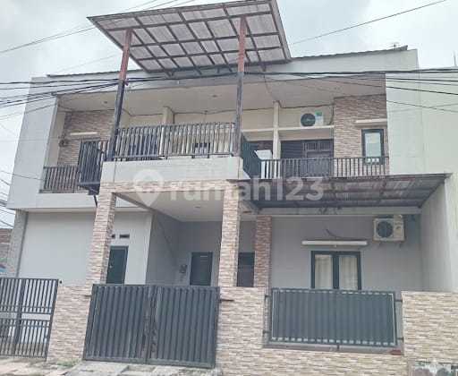 Di Jual Rumah Kost 2Lt di Hook + Tempat Usaha di Harapan Indah 1 Bekasi