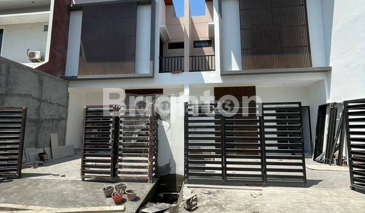 RUMAH BARU KEMBAR modern Tropical 1 unit di Sutorejo timur SIAP HUNI 1