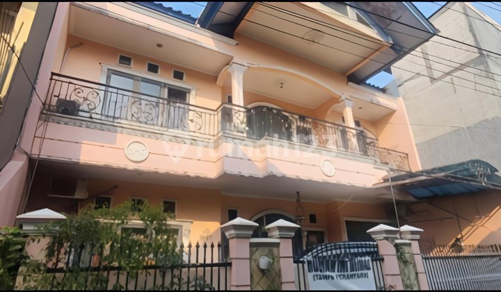 DIJUAL RUMAH PONNDOK KELAPA 9 KAMAR COCOK UNTUK KOSAN 