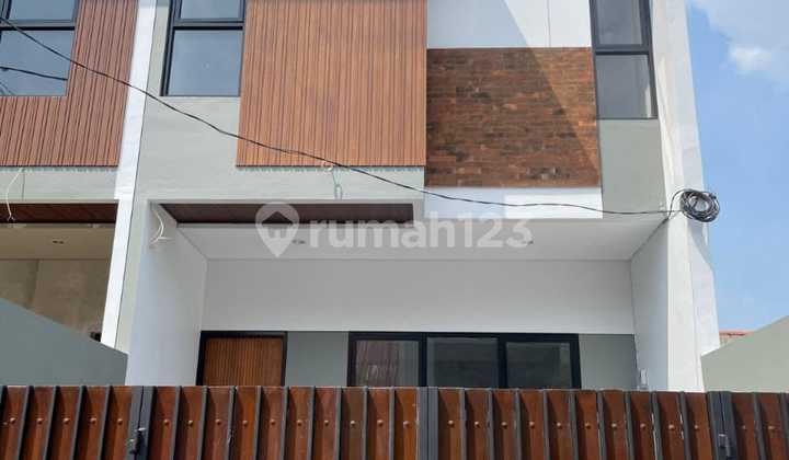 Dijual Rumah Dengan Desaign Modern Dalam Perumahan Pondok Gede Rumah