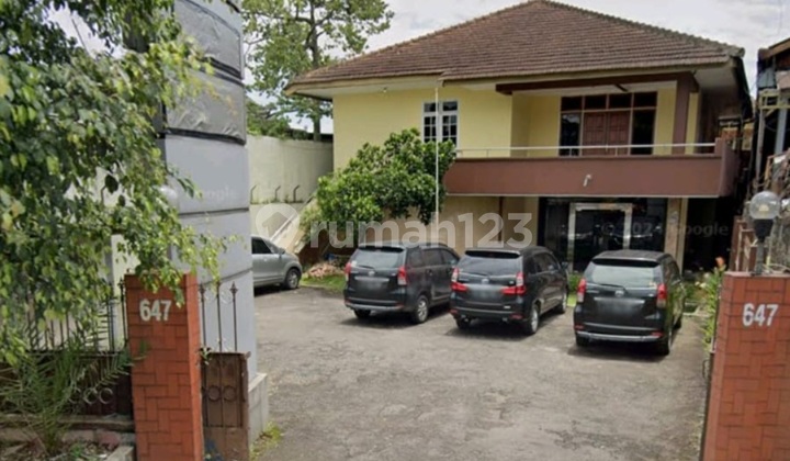Two-story house/office/commercial space on Soekarno Hatta.