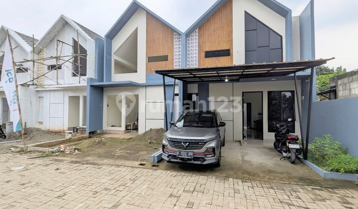 Rumah Mezzanine Luas 85 M2 Hanya 10 Menit ke Kantor Brin