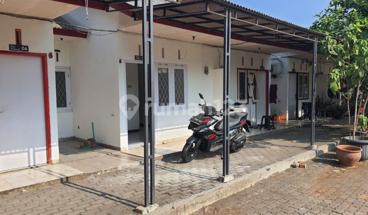 SPECIAL PRICE! One-room boarding house with private kitchen inside the house, featuring a spacious car parking area. 2