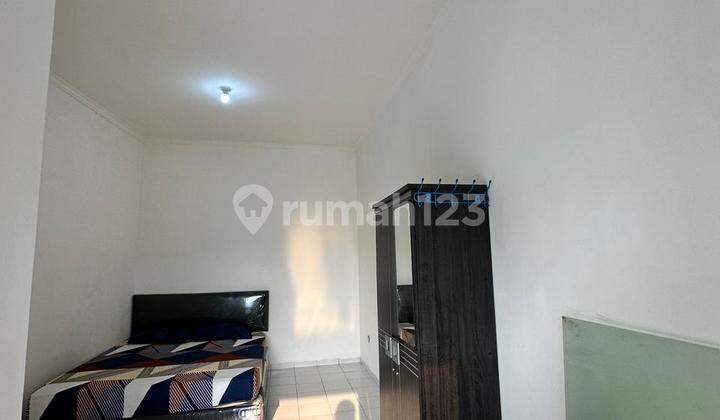 Exclusive and Comfortable Boarding House within a Private Compound with Hot Water and Car Parking Area Available.