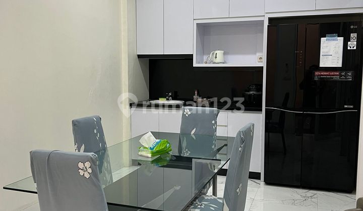 Rumah bagus, full furnished siap huni di Daan Mogot Baru 2