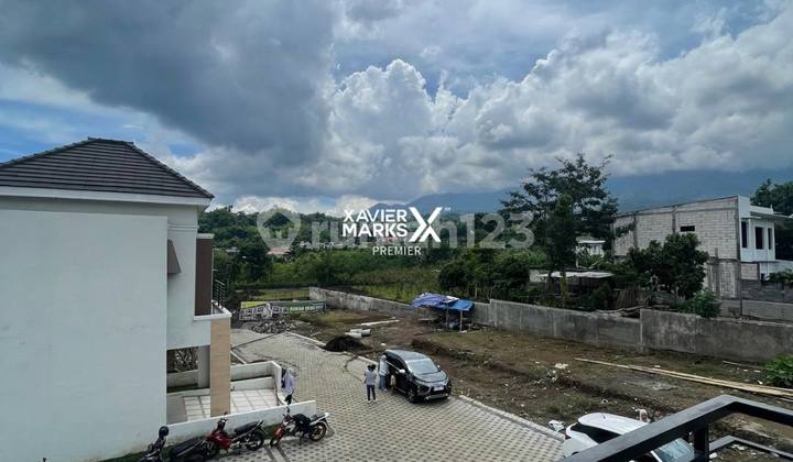 Rumah Modern Minimalis Ala Villa Affordable di Green Amalia, Junrejo Batu 2