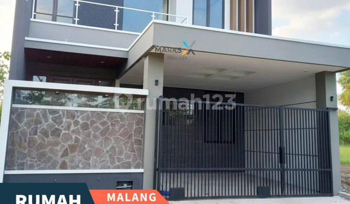 Rumah Design Modern Lokasi di Cluster Valley The Araya Malang