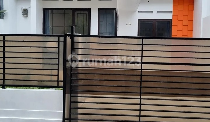 Minimalist 1.5-Story House in Kelapa Dua, Depok