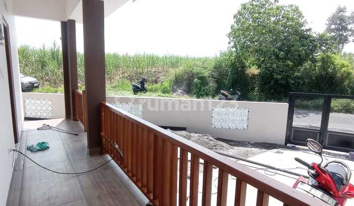 New House Ready to Live Classic Design by Main Asphalt Road located in Bakungan, Wedomartani, Yogyakarta. Near MinomartaniLand Area 131 M²Building Type 51Front Width 15 Meters2 Bedrooms1 BathroomSpacious Front GardenWide CarportLegal with Ownership Certificate 2