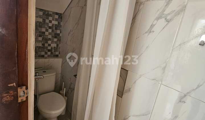 Rumah Murah 2 Lantai di Renon 2