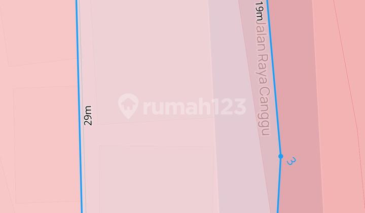 Land Plus Shop Building Located at a Corner Position