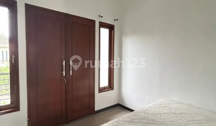 Affordable 2-Story Minimalist House Semi-Furnished Ready to Live Near Gwalk at Villa Sentra Raya Citraland Utama West Surabaya 2