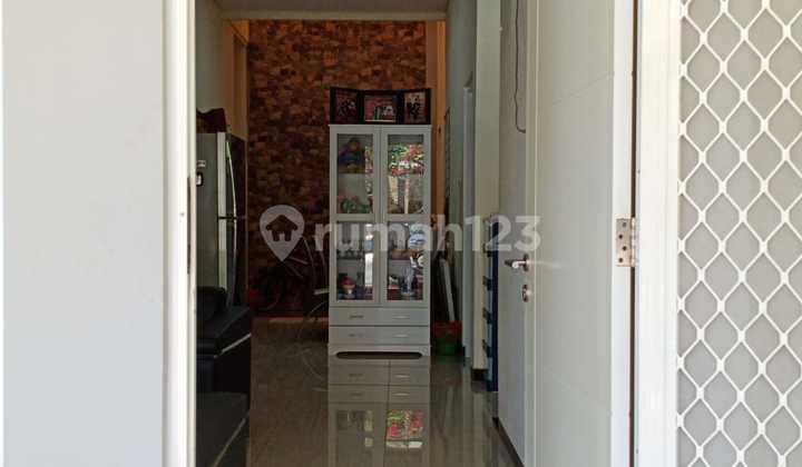 Affordable 2-Storey Minimalist House Near Modern Market in Taman Puspa Raya, Citraland Utama, West Surabaya 2