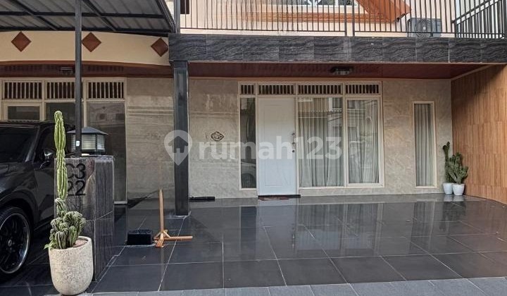 Affordable 1.5 Story Minimalist House Fully Furnished Ready to Occupy Near Gwalk in International Village Citraland Utama West Surabaya