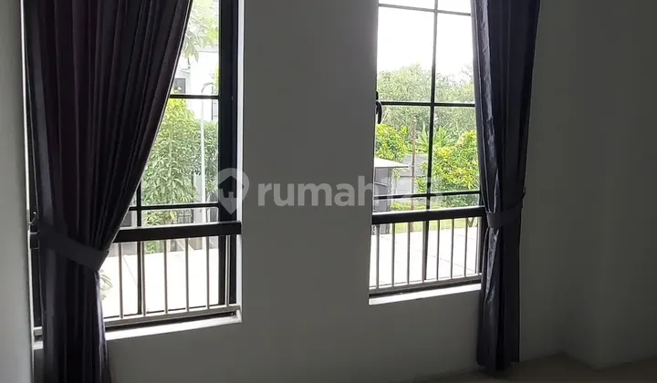 Affordable 2-Story Minimalist House Semi-Furnished Ready to Occupy Near Modern Market in Oakwood Citraland Utama West Surabaya 2