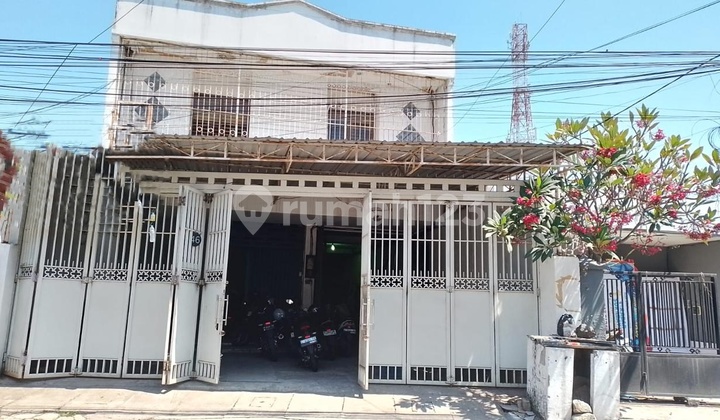 For sale: shop, office building, and workshop.