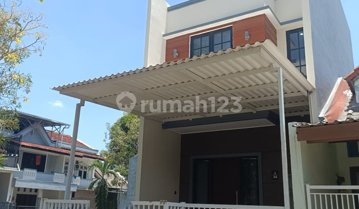 rumah terenovasi bukit palma