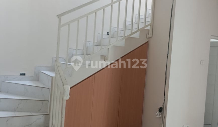 rumah terenovasi bukit palma 2