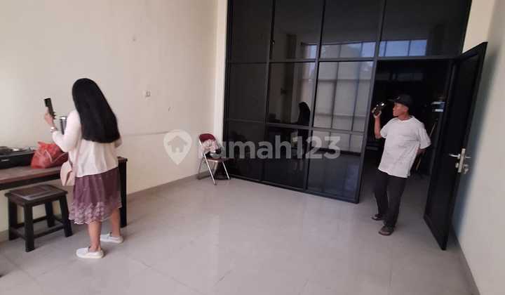 3-Storey Shop House. Good Building in Front of H Medical Campus of Gunadarma. 3 Floors • Floor 1: Kitchen + Bathroom + Floor Dining Area • Floor 2: Office + Bathroom • Floor 3: Large Kitchen + Bedroom + 2 Bathrooms • 7000watt Electricity • Land Area 91m2 2