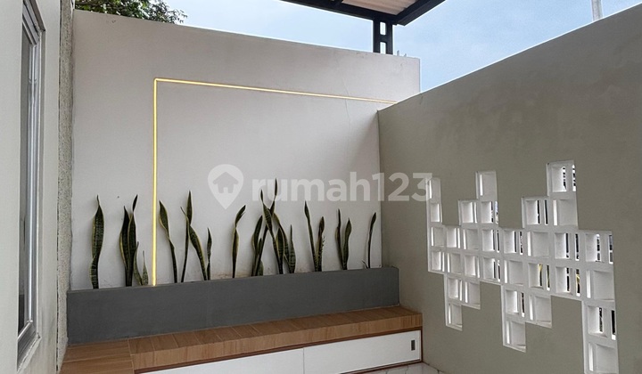 Rumah 2 Kamar Tidur Dengan Dinding Bata Merah 2