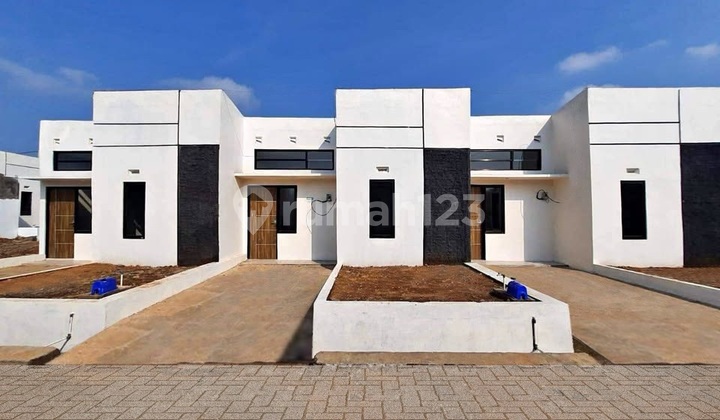 Rumah 2 Kamar Tidur Dengan Dinding Bata Merah