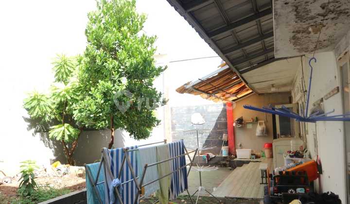 For Sale Move-In Ready House with Spacious Yard in Taman Harapan Baru Bekasi 2