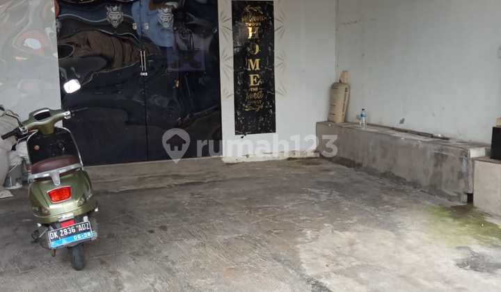 Rumah Lantai 1 Semi Furnished Lokasi Strategis di Renon 2