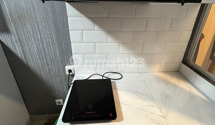 Furnished Apartment at Sudirman Suites 3rd Floor with Pool View 2